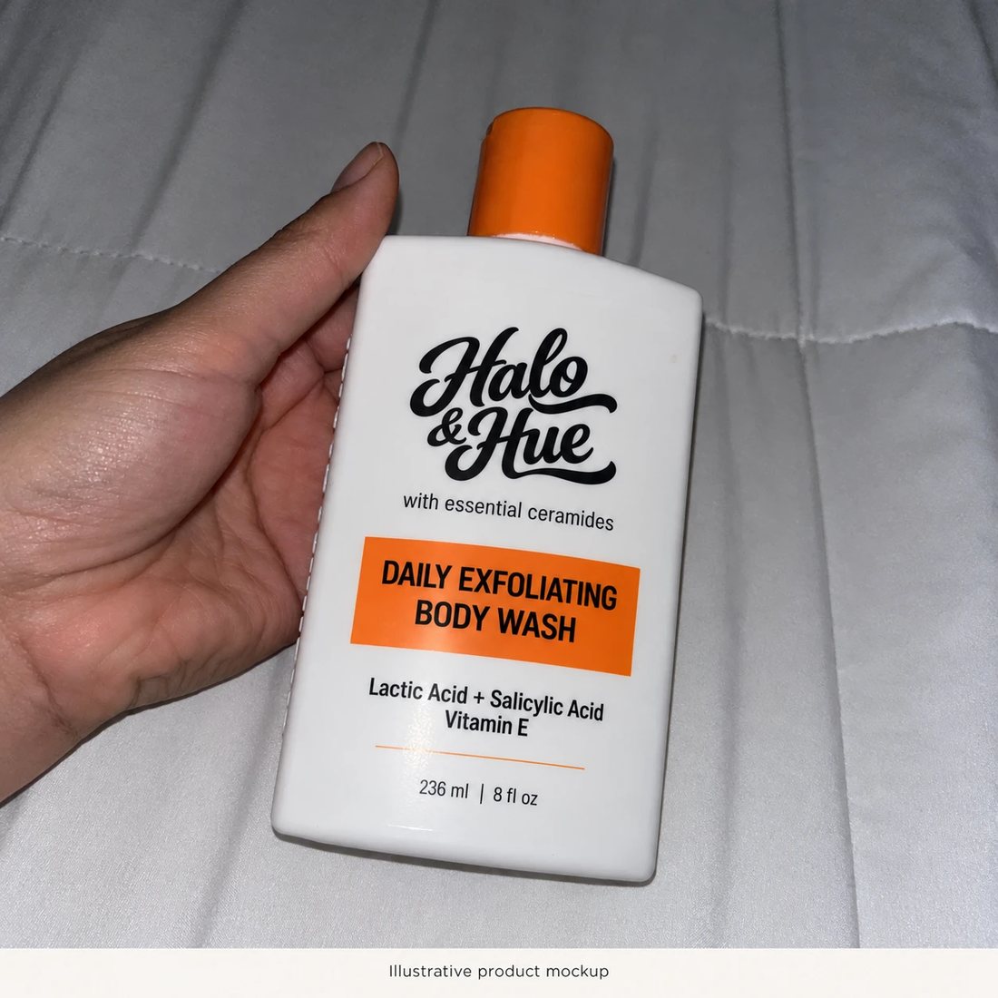 Hand holding the Daily Exfoliating Body Wash
